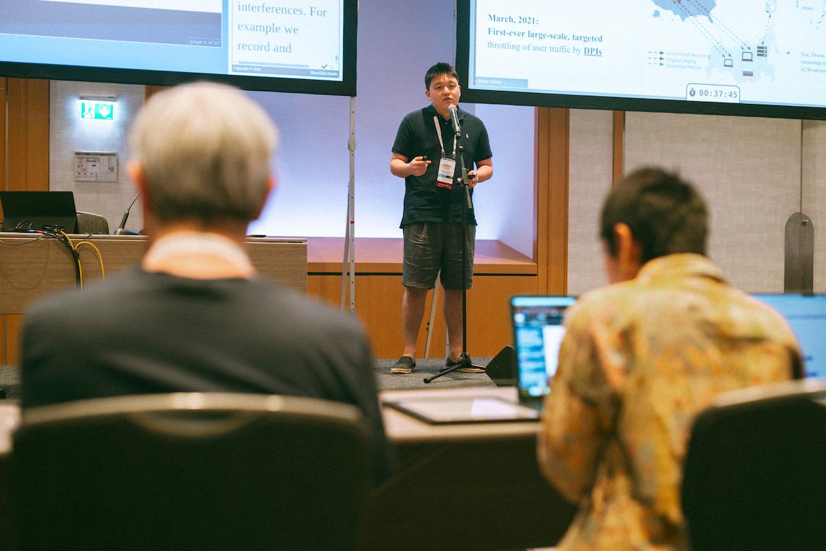 Diwen Xue presents at the IRTFOPEN session during the IETF 126 Vienna meeting, 18-24 July 2026